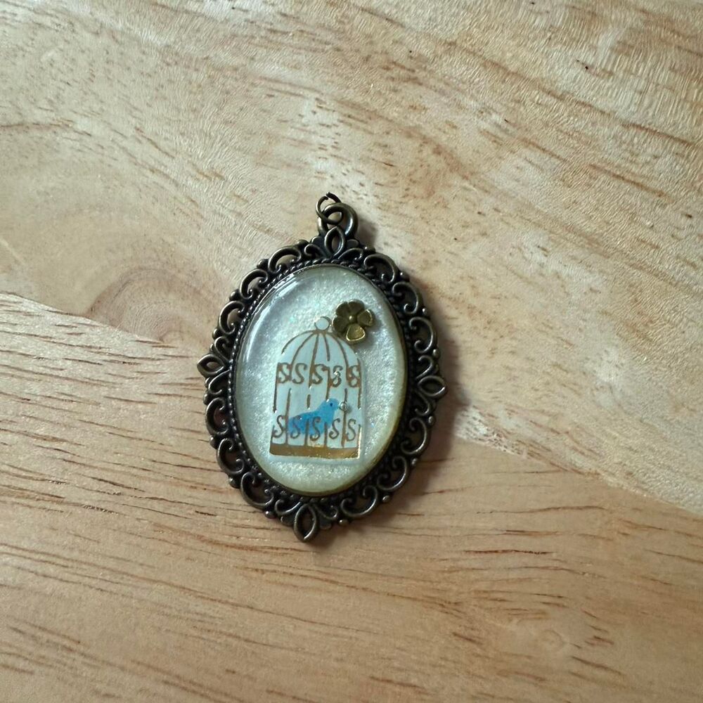 Blue bird in a cage Pendant